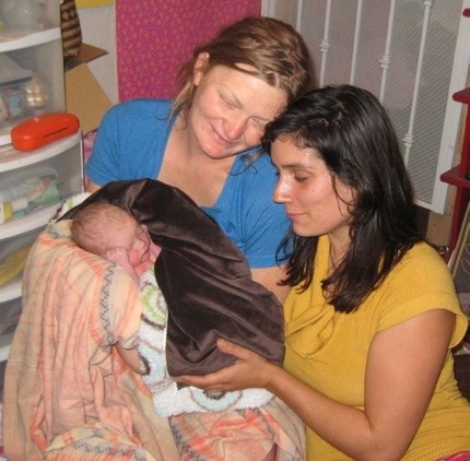 Newborn, mom and midwife